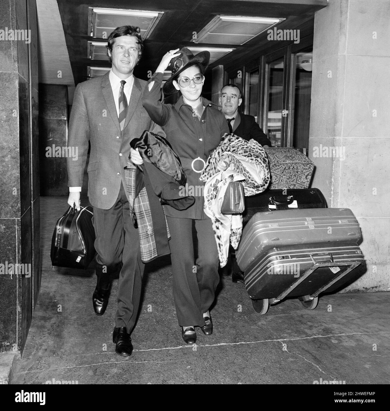 Roger Moore and his wife Luisa heading off on their honeymoon. 13th April 1969. Stock Photo