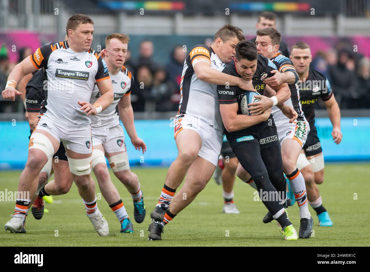 Barnet, United Kingdom. 05th Mar, 2022. Gallagher Premiership Rugby. Saracens V Leicester Tigers. StoneX Stadium. Barnet. Sean Maitland of Saracens is tackled Credit: Sport In Pictures/Alamy Live News Stock Photo