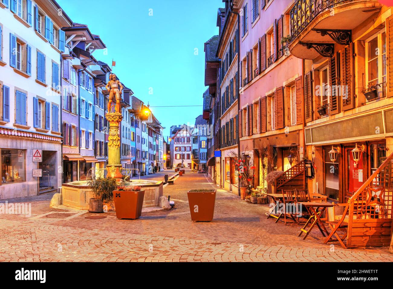 Night scene in Place du Marche in the charming medieval town of La Neuville, located between Neuchatel and Biel / Bienne on the shores of Biel Lake an Stock Photo