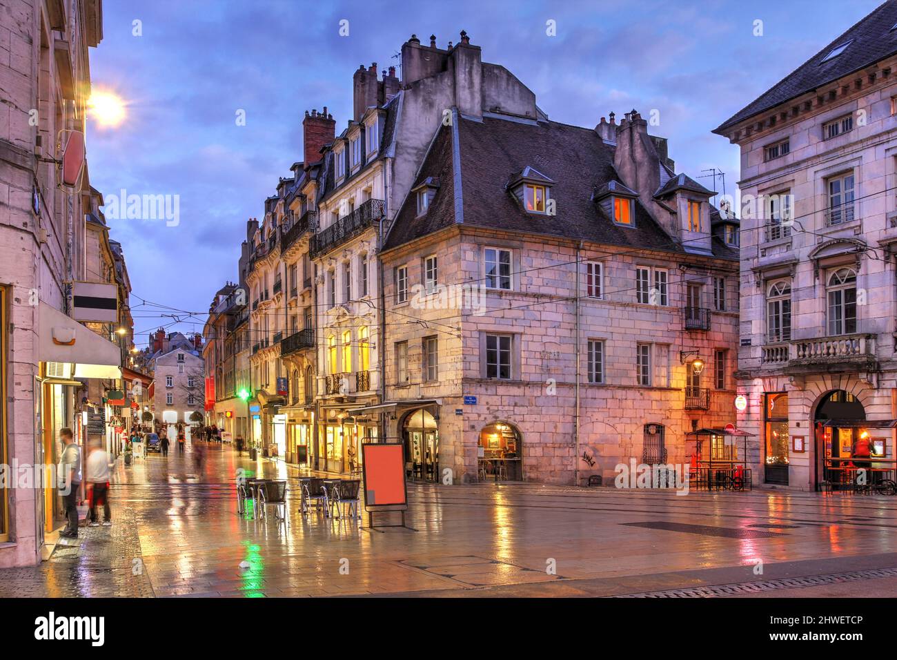 Rue Madeleine at twilight with histroical houses in the old town Besançon, France. Stock Photo