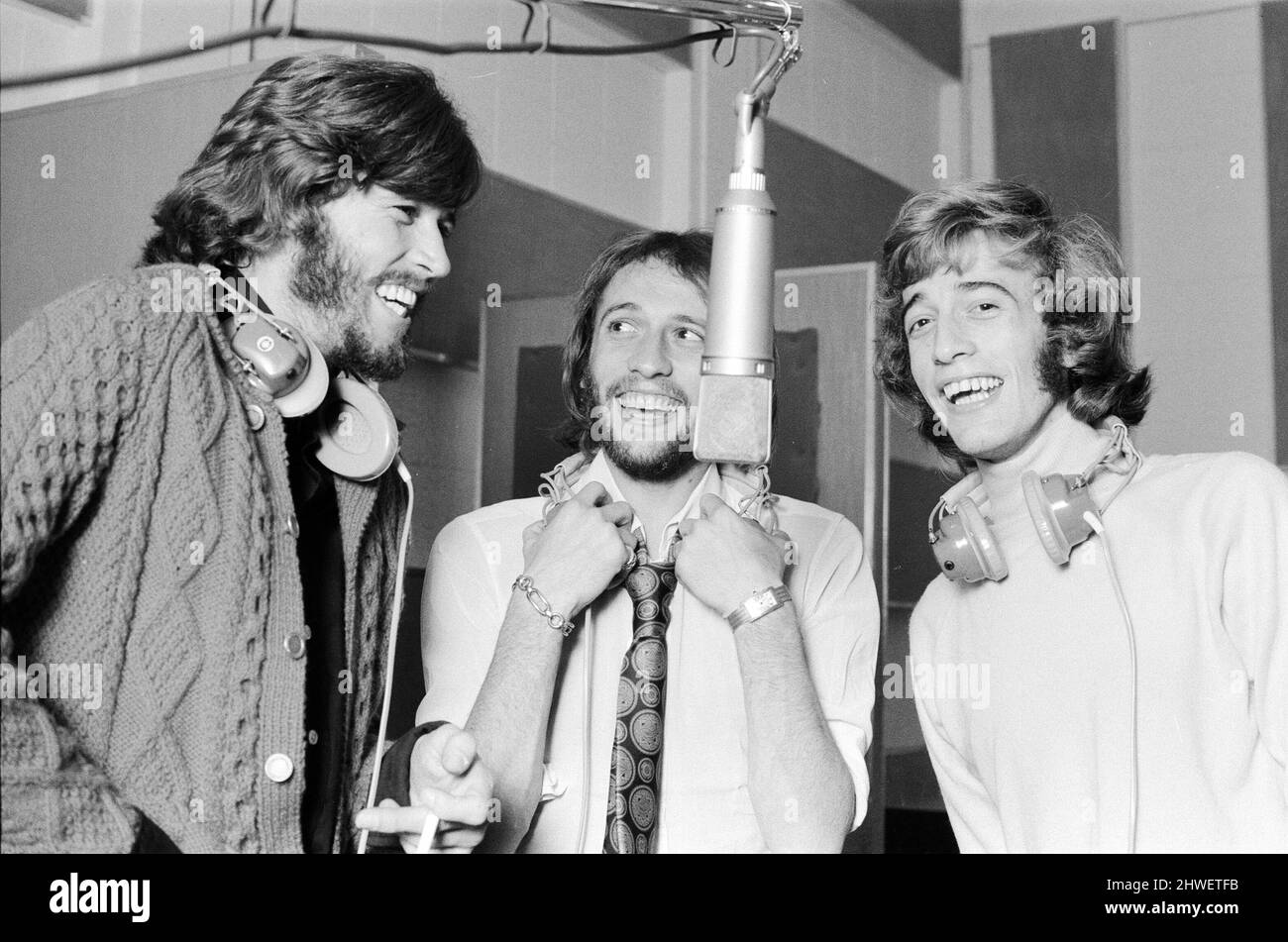 The Gibb Brothers a.k.a. The Bee Gees, newly reunited & back in the recording studio together, Soho London 3rd September 1970.   Hard at work on their first united venture in nearly two years.    Barry Gibb (24), who married former beauty queen Linda Gray 2 days earlier (1st sept.), broke his honeymoon to join his twin brothers Robin & Maurice Gibb in the studio. Stock Photo