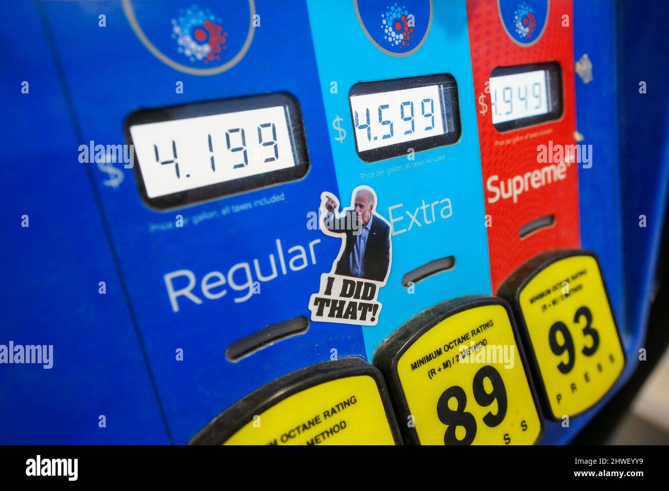A sticker depicting President Joe Biden pointing at prices of gas is seen on a gas pump March 5, 2022, at Exxon gas station in Emmaus, Pennsylvania. Stock Photo