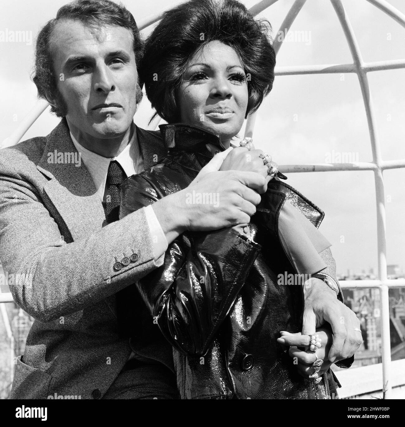 Shirley Bassey is back in London after an absence of two years. She will appear on the Simon Dee show, film an apperence with Engelbert Humperdinck and will be at The Talk of the Town for two weeks. Shirley is pictured at The Dorchester Hotel with her husband, who is now her manager, Sergio Novak. 5th April 1970. Stock Photo