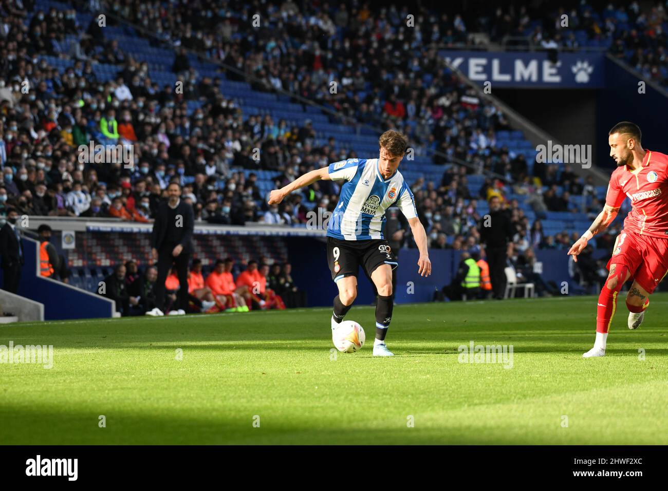 BARCELONA/SPAIN - MARCH 5: Puado of Espanyol drives the ball during La Liga match between Espanyol and Getafe at RCDE Stadium on March 5, 2022 in Barcelona, Spain. (Photo by Sara Aribó/Pximages) Stock Photo