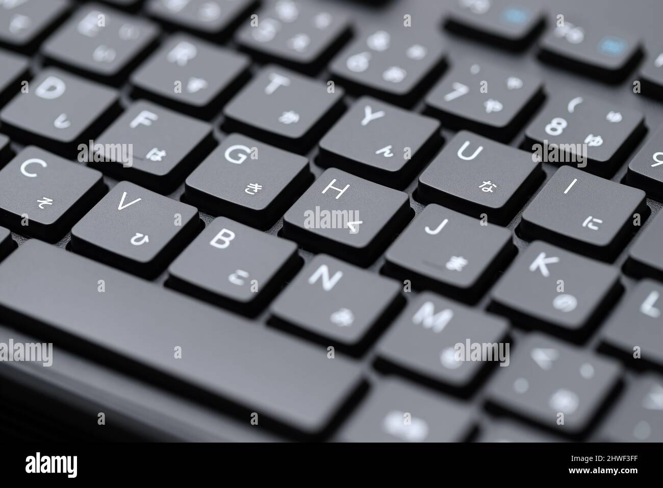 Close up of computer keyboard. Alphabetics and Japanese hiragana typing keyboard. Stock Photo