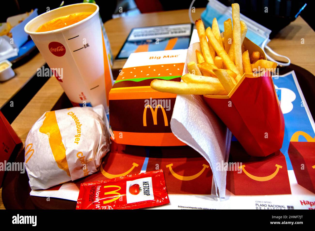 McDonald's Menu served in Europe. Mcdonald´s menus sizes in europe. Big mac, fanta drink, fries, cheesburguer and ketchup. Stock Photo