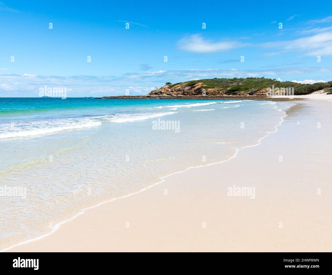 Long beach is one of the many pristine white sand beaches on Keppel Island in  tropical Queensland. Stock Photo