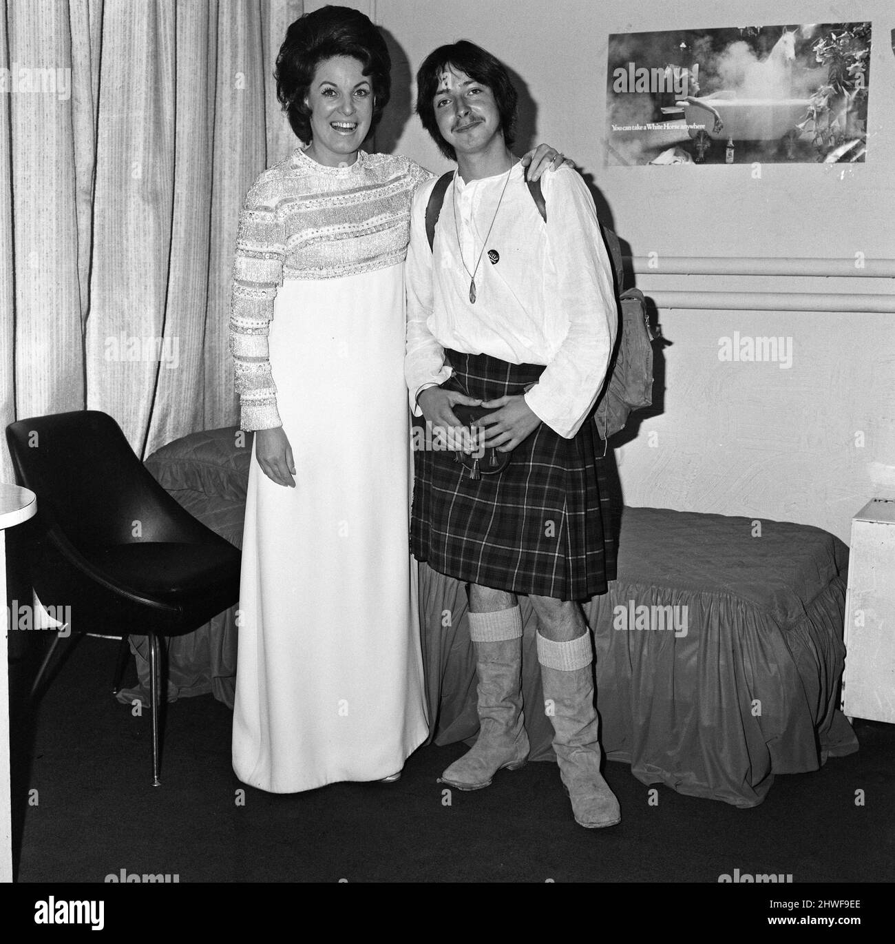 Chris young, who has walked to India and back for the charity 'Help The Aged'. Pictured with Scottish singer Moira Anderson in her dressing room at the London Palladium. 24th September 1970. Stock Photo