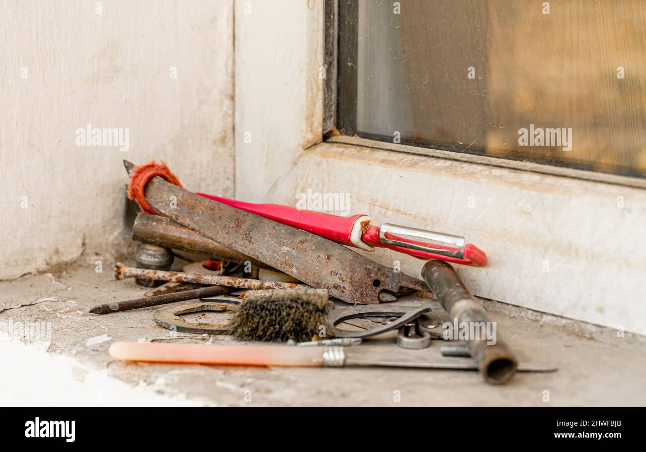 metal instruments, rusty in the corner of dusty windowsill Stock Photo ...
