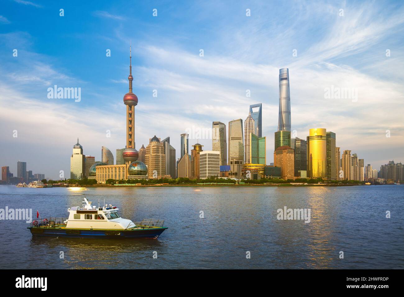 Skyline of Pudong district by Huangpu River in Shanghai, China Stock Photo