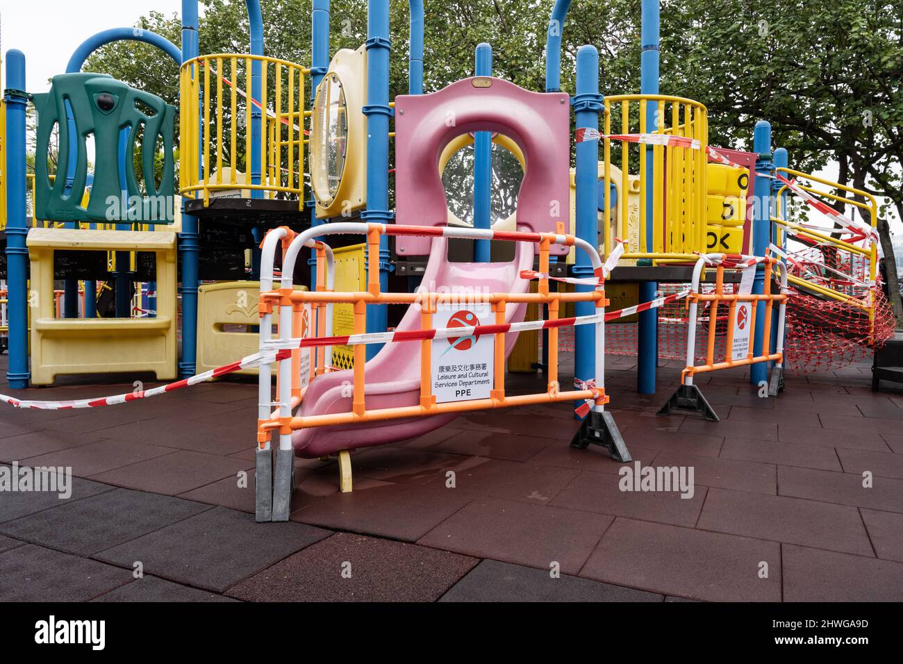 Zero Covid Hong Kong. Omicron.  2022.  Covid social restrictions in Hong Kong forcing public places and recreational facilities  to close due to Omicron. Childrens playground closed. Stock Photo
