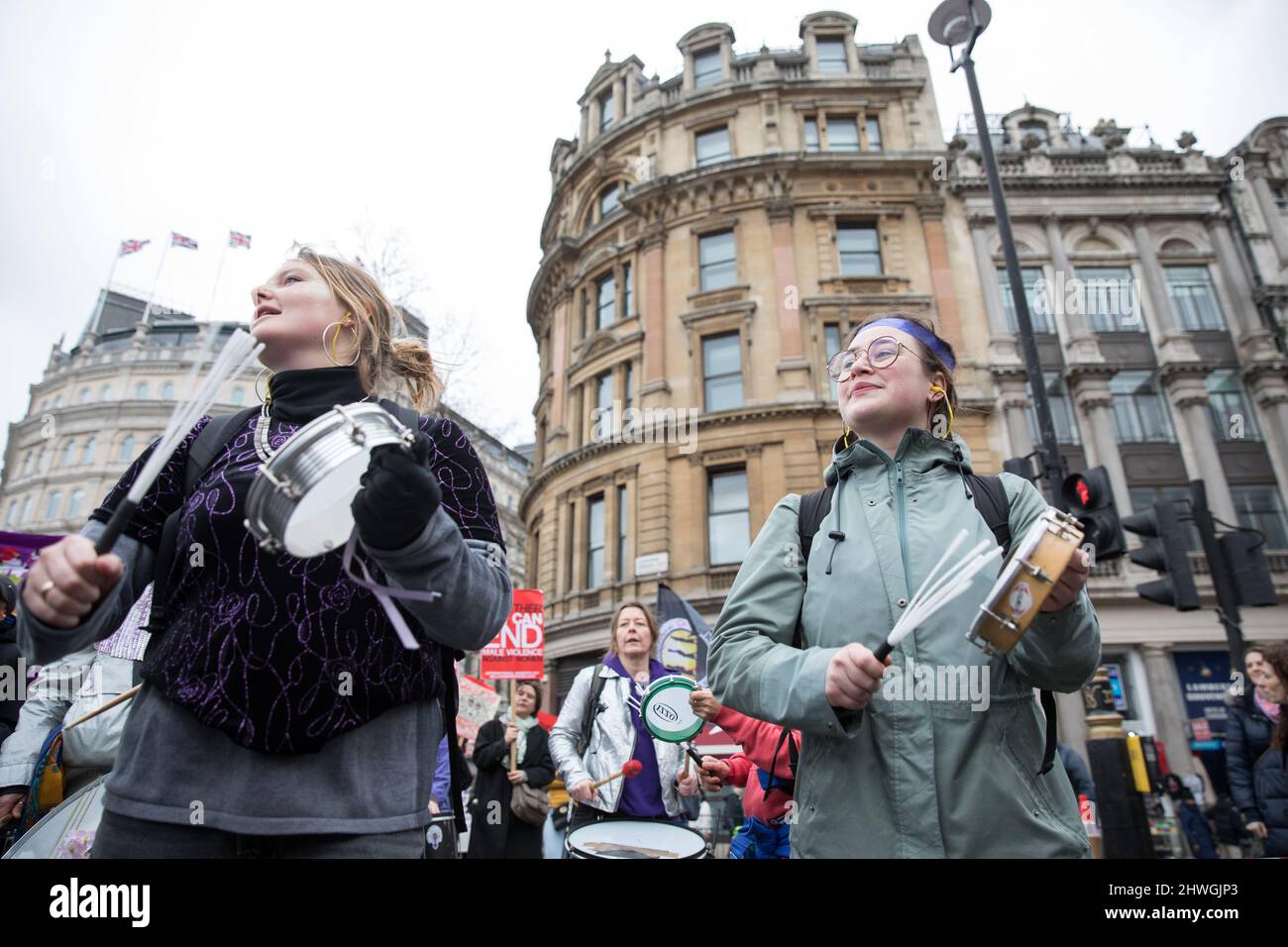 London, UK. 05th Mar, 2022. Young women use percussion instruments during the rally in support of women's rights and against male violence in the streets of central London. Credit: SOPA Images Limited/Alamy Live News Stock Photo