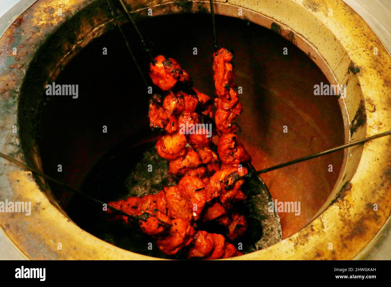 indian tandoori kebabs or tikka in a skewer cooked on the clay oven