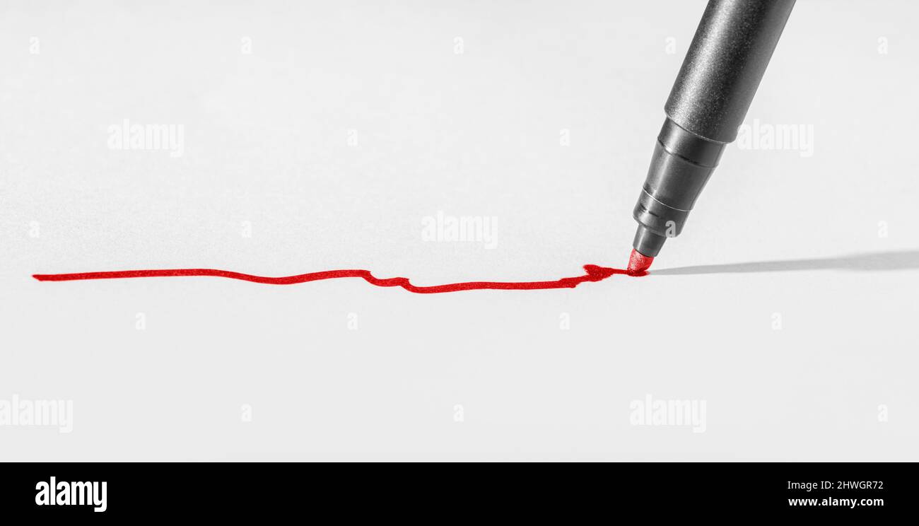 https://c8.alamy.com/comp/2HWGR72/art-and-craft-theme-showing-a-felt-pen-tip-and-a-line-of-red-dye-on-paper-ground-2HWGR72.jpg