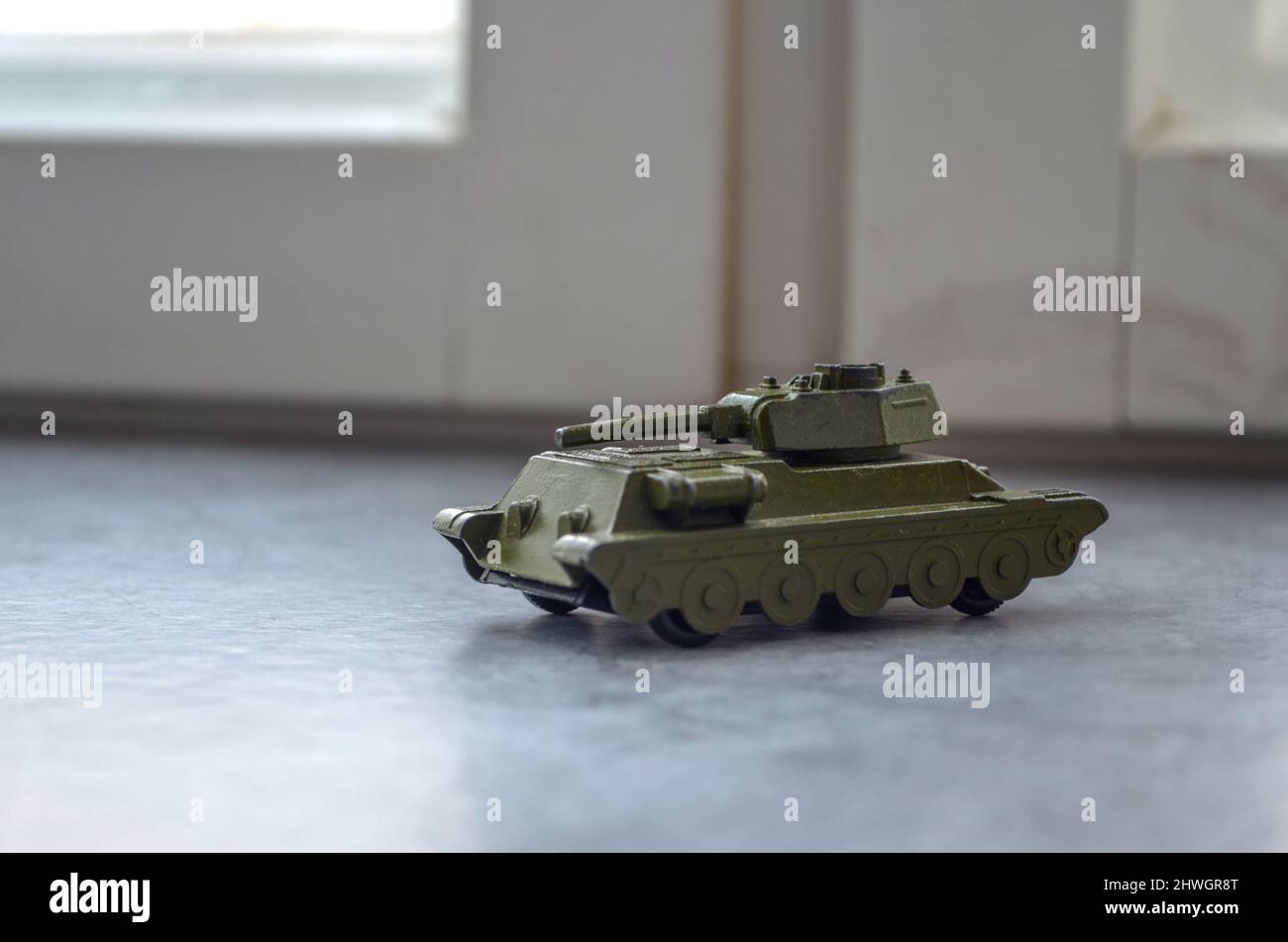 old military toy model of tank stands on the windowsill Stock Photo Alamy