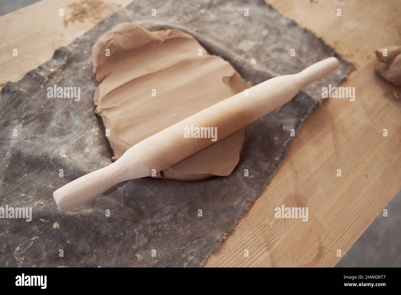 Used pottery tool left on rolledout clay slab Stock Photo Alamy