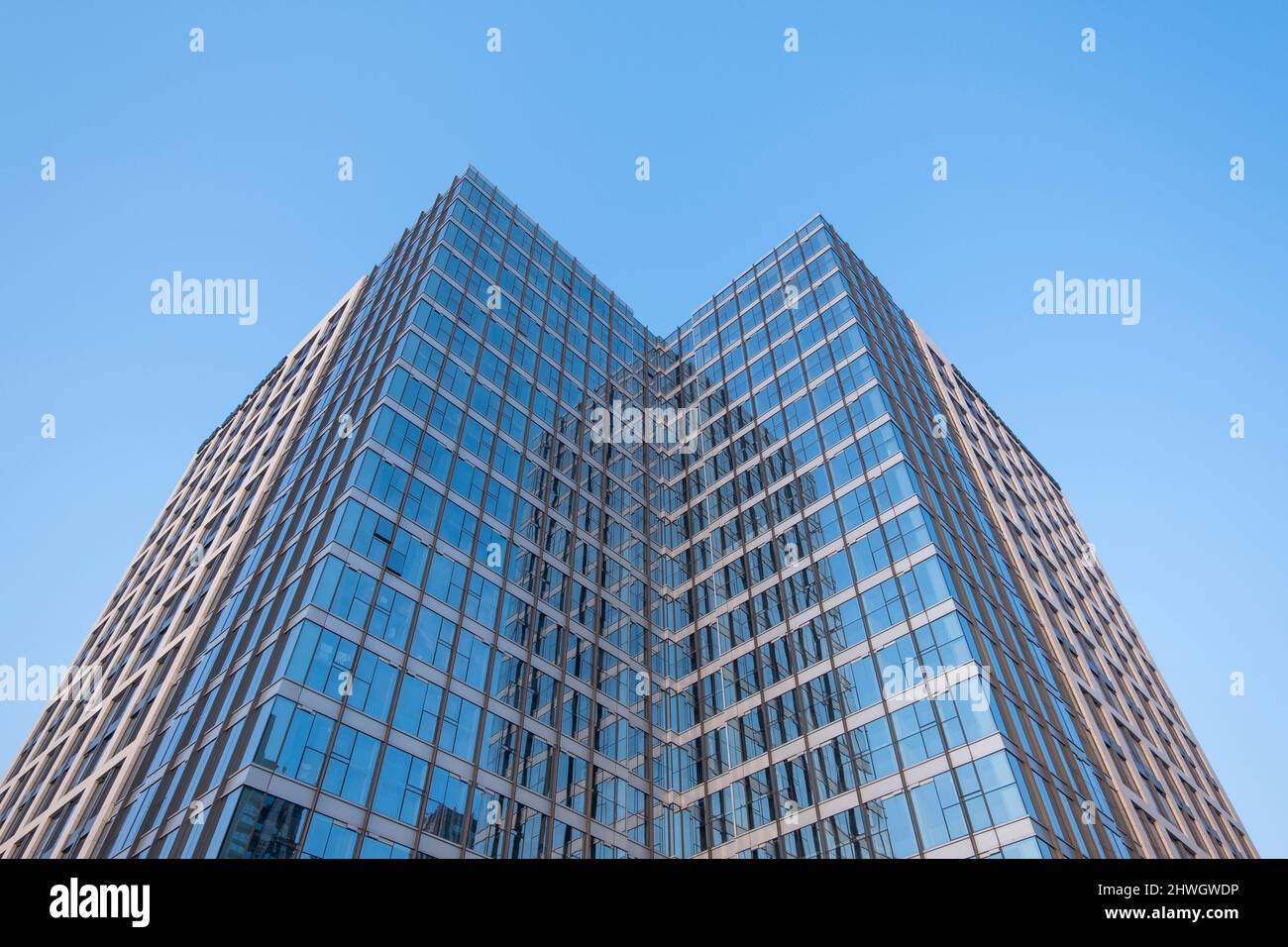 modern office building under blue sky Stock Photo - Alamy