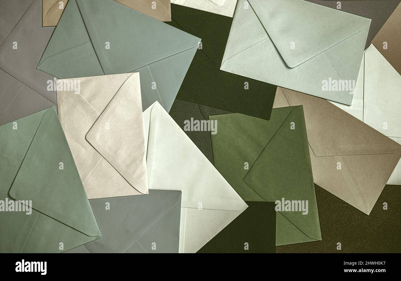 Different colored envelopes on the table Stock Photo