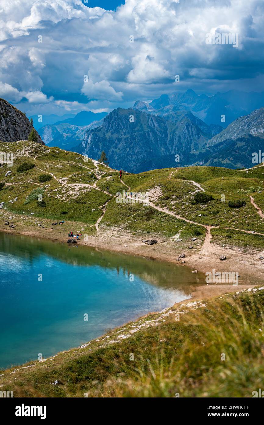 dolomites-monte-civetta-and-the-coldai-lake-dream-summer-stock-photo