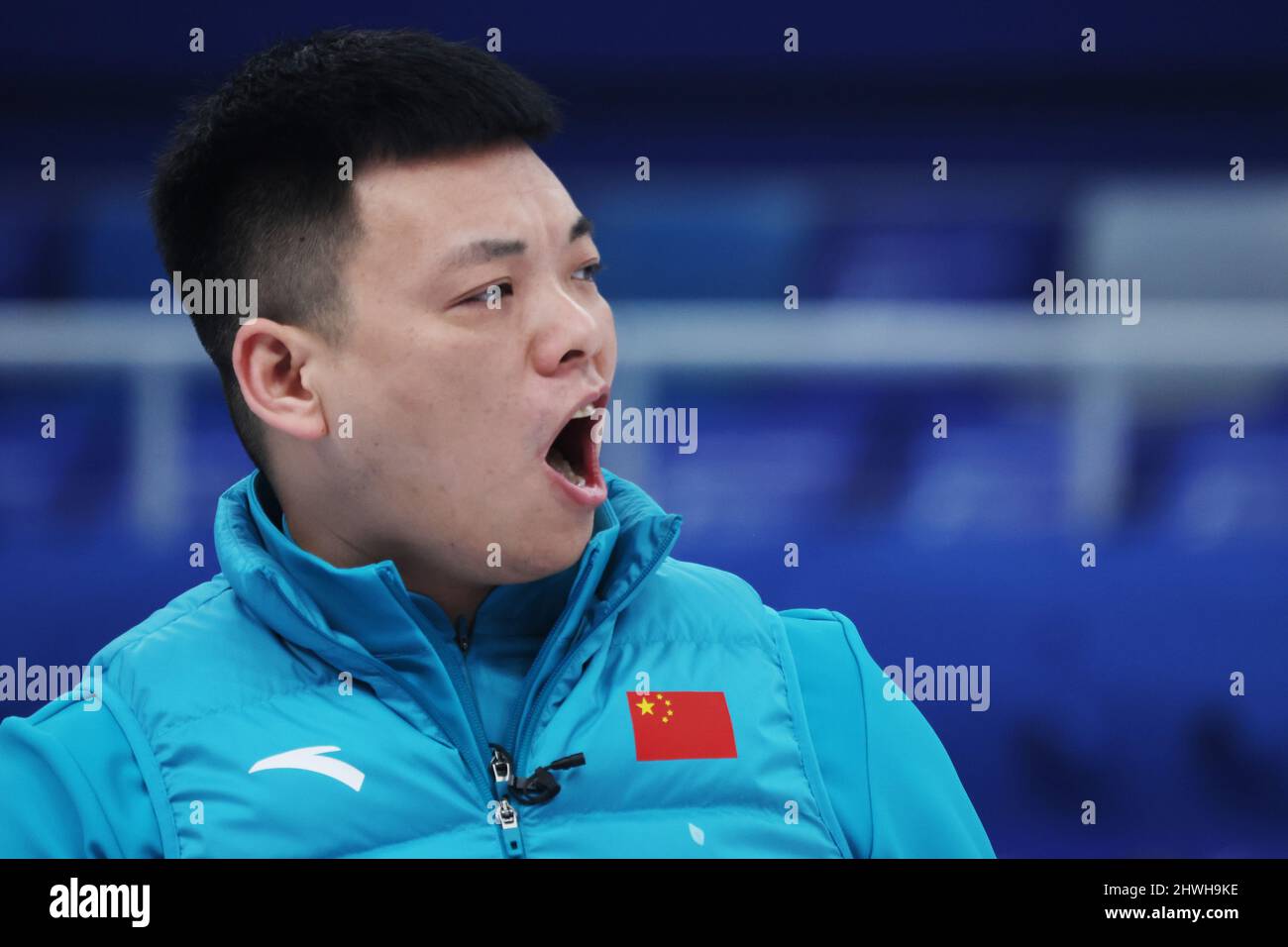 Beijing, China. 6th Mar, 2022. Zhang Mingliang of China reacts during ...