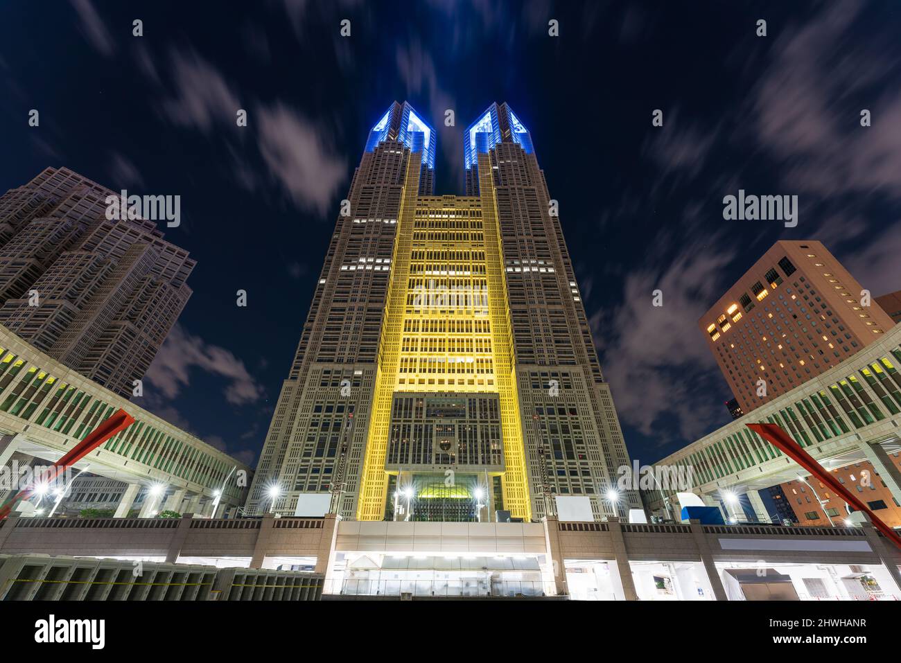 Tokyo Metropolitan Government building light up in support of Ukraine in Tokyo, Japan. Stock Photo