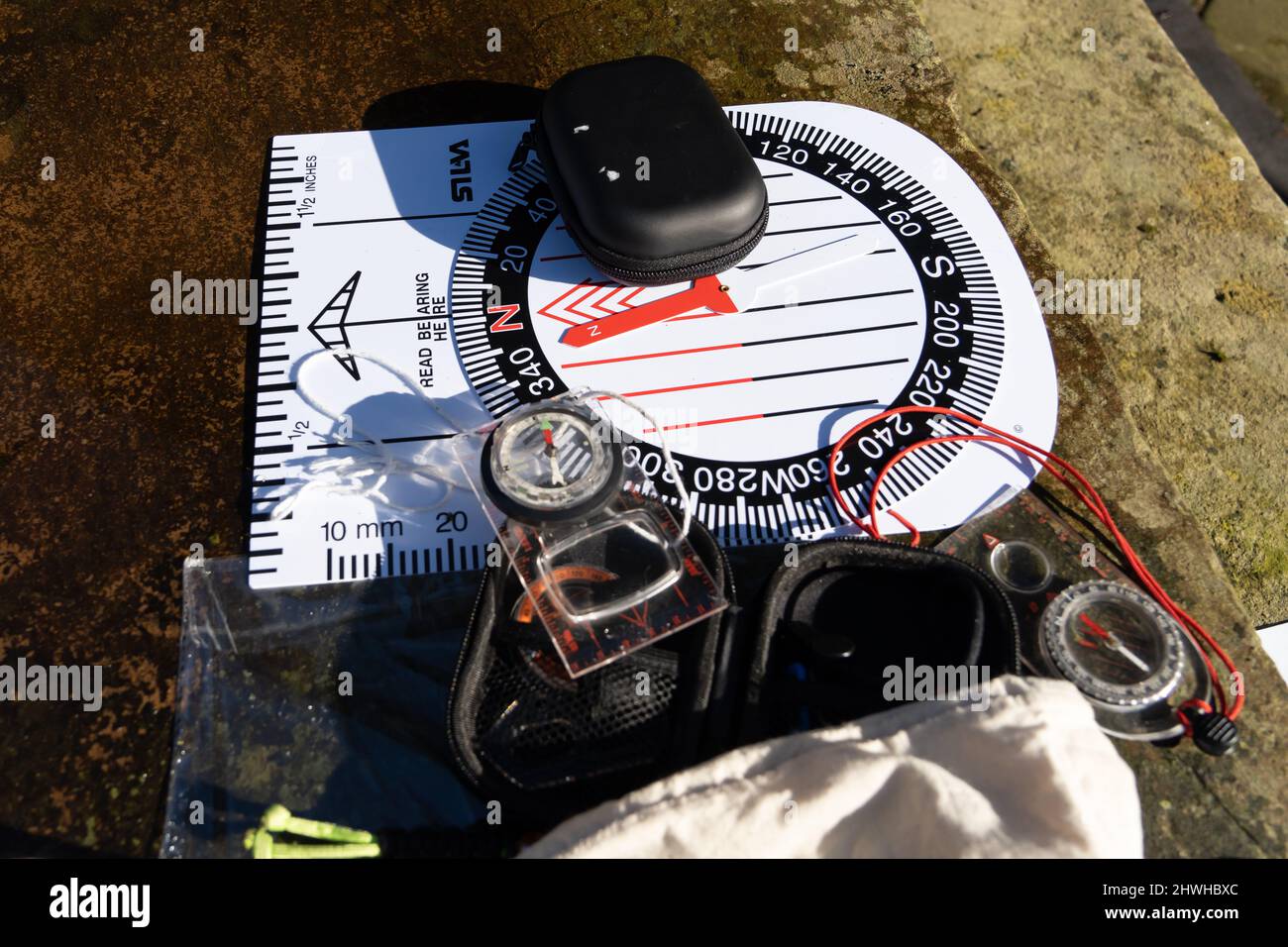 Orienteering training equipment on an outdoor table. Stock Photo