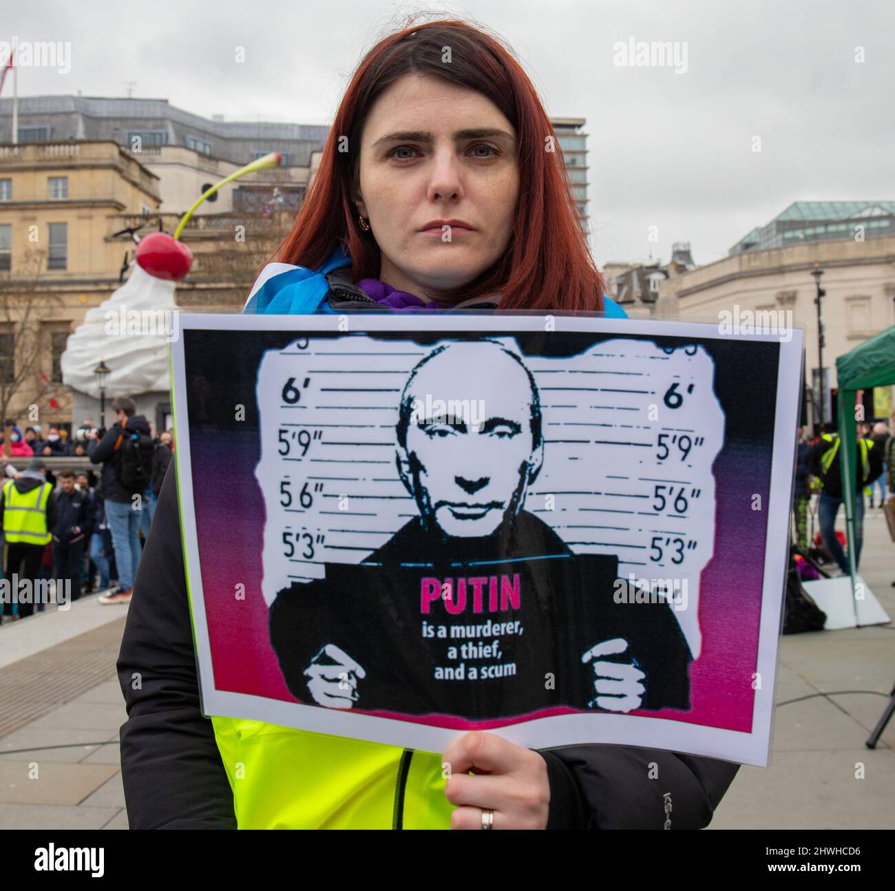 London, England, UK 5 March 2022 Around a thousand protesters gather in Trafalgar Square in solidarity with Ukraine and against Russia’s invasion of the country. Women and children hold banners, posters and placards with messages to Putin and Russia Credit: Denise Laura Baker/Alamy Live News Stock Photo