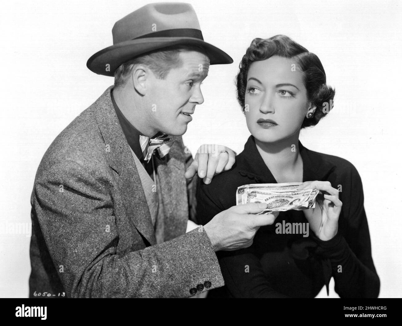 DAN DURYEA and DOROTHY LAMOUR in MANHANDLED (1949), directed by LEWIS R. FOSTER. Credit: PARAMOUNT PICTURES / Album Stock Photo