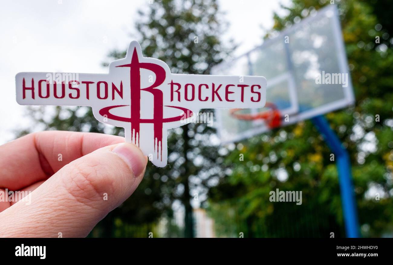 September 15, 2021, Houston, USA, A man holds the emblem of the Houston ...