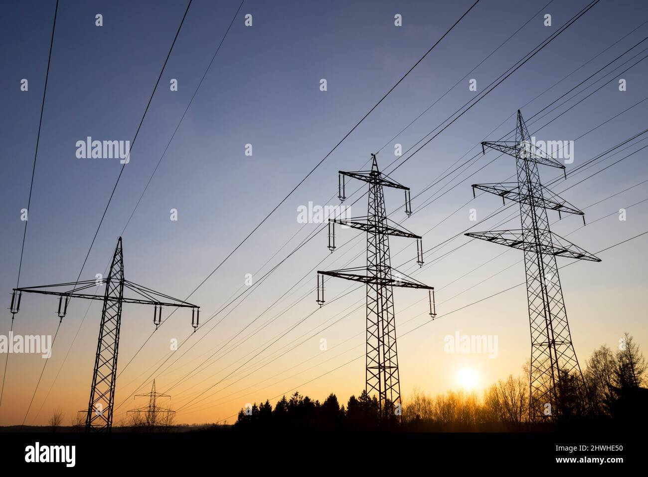high voltage road evening sky silhouettes Stock Photo