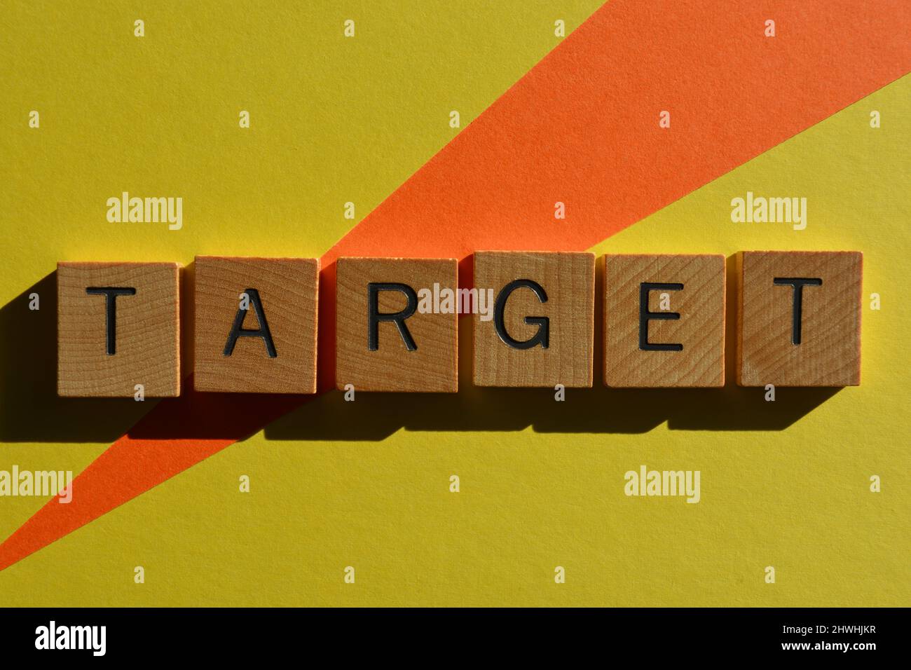 Target, word in wooden alphabet letters isolated on bright and