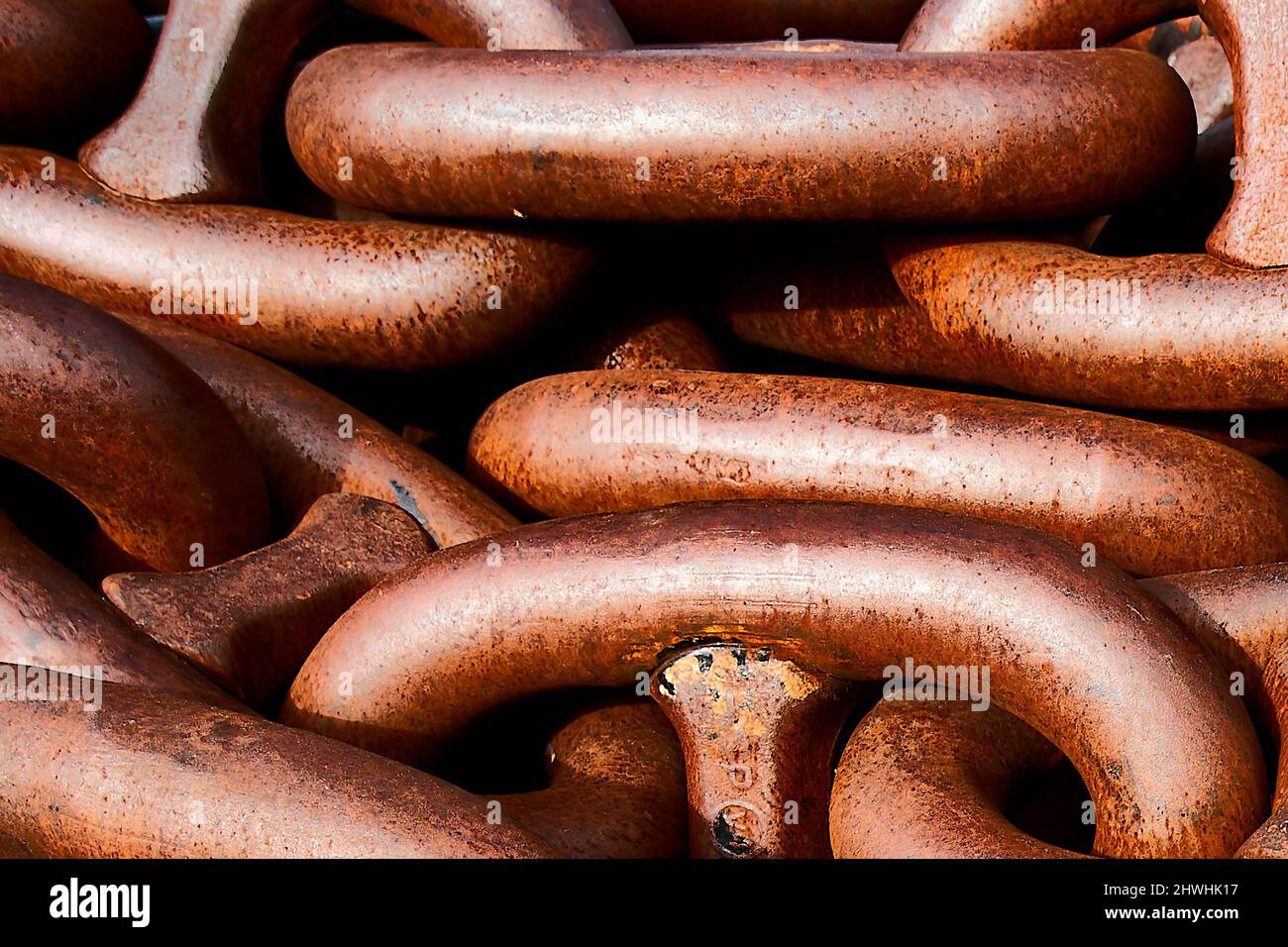 Detail of the stacked links of a large ship's chain Stock Photo