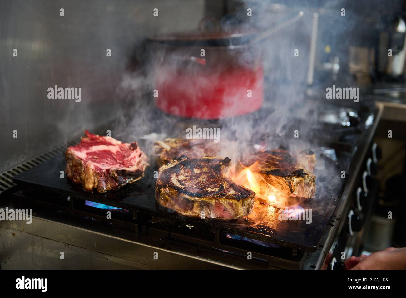 Thick beef steaks on the grill Stock Photo Alamy