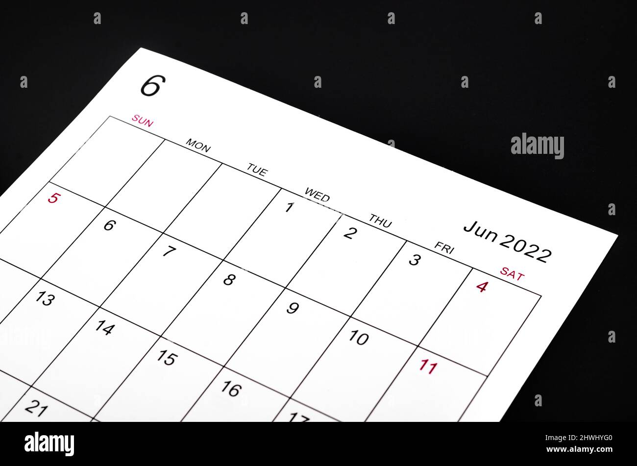 Close up June 2022 calendar sheet on black background Stock Photo - Alamy