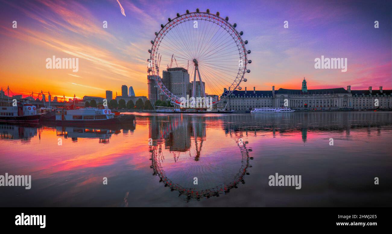 Panoramic photo London Eye Reflection with Sunrise City Thames river Stock Photo