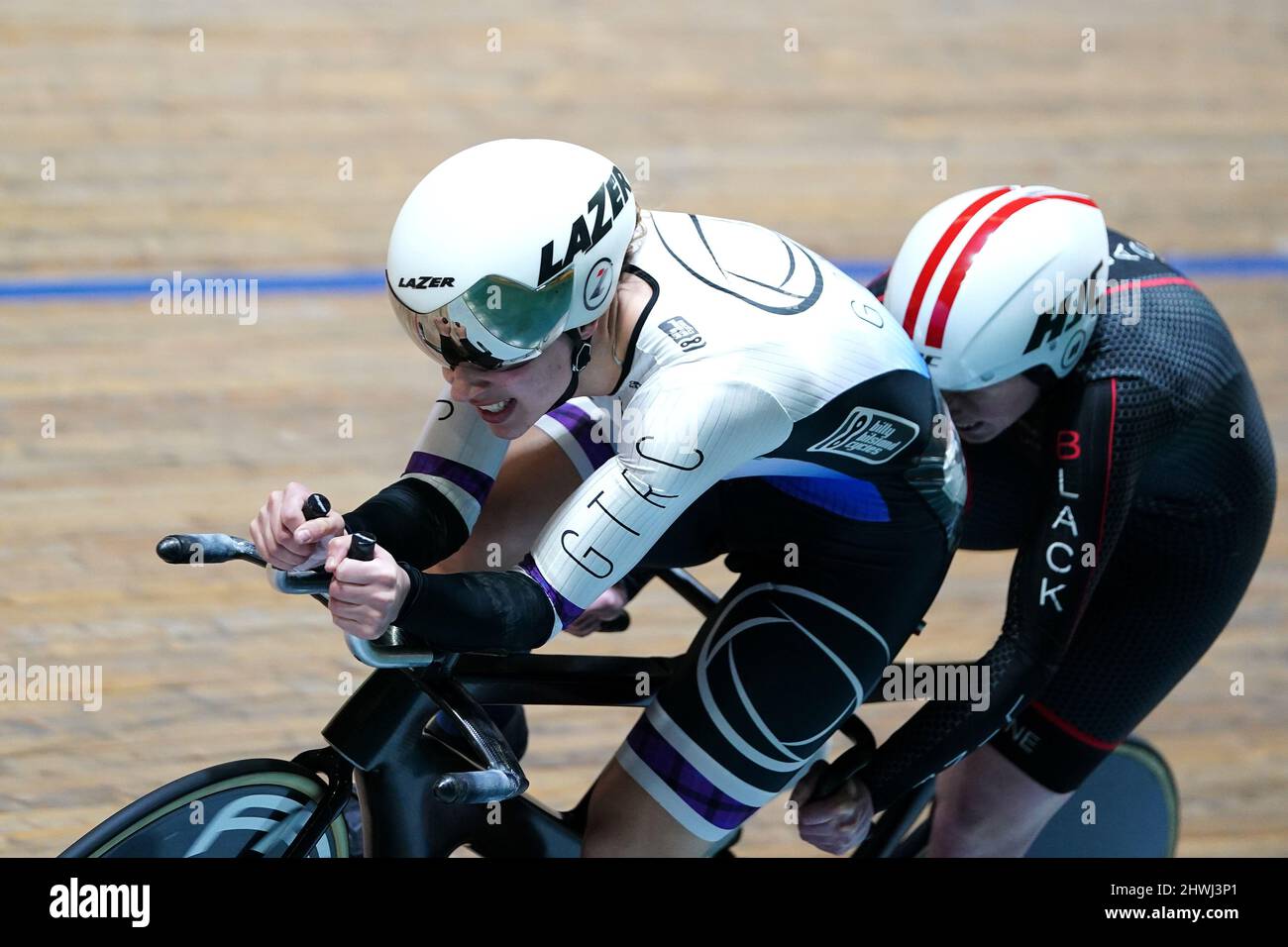 Lora Fachie MBE (left) and pilot Georgia Holt on their way to winning the Para Woman B Time Trial during day four of the HSBC UK National Track Championships at the Geraint Thomas National Velodrome, Newport. Stock Photo