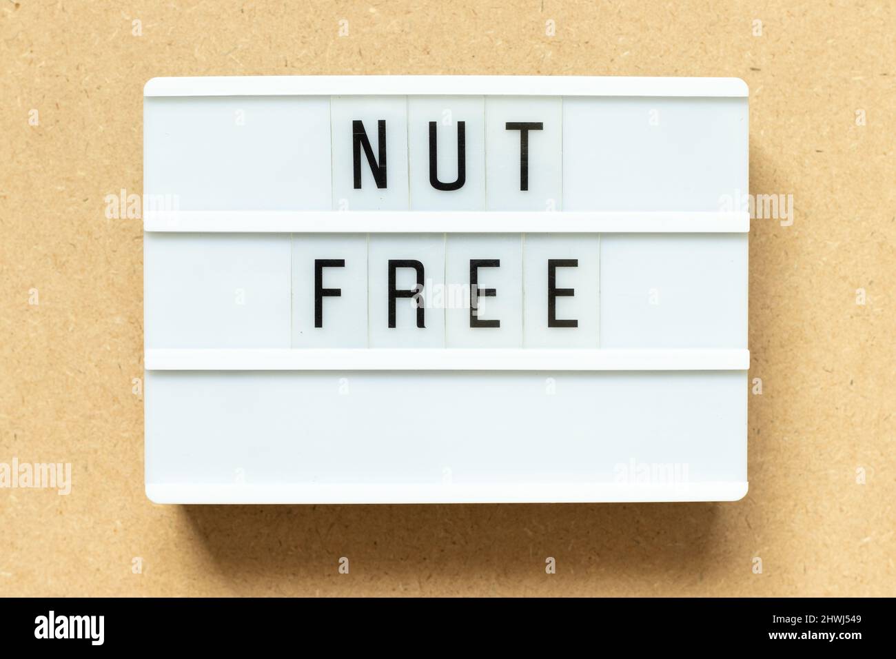 Lightbox with word nut free on wood background Stock Photo