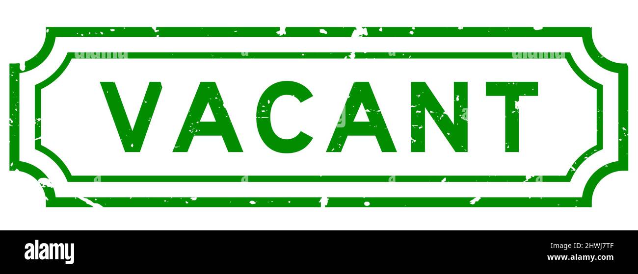 Grunge green vacant word rubber seal stamp on white background Stock