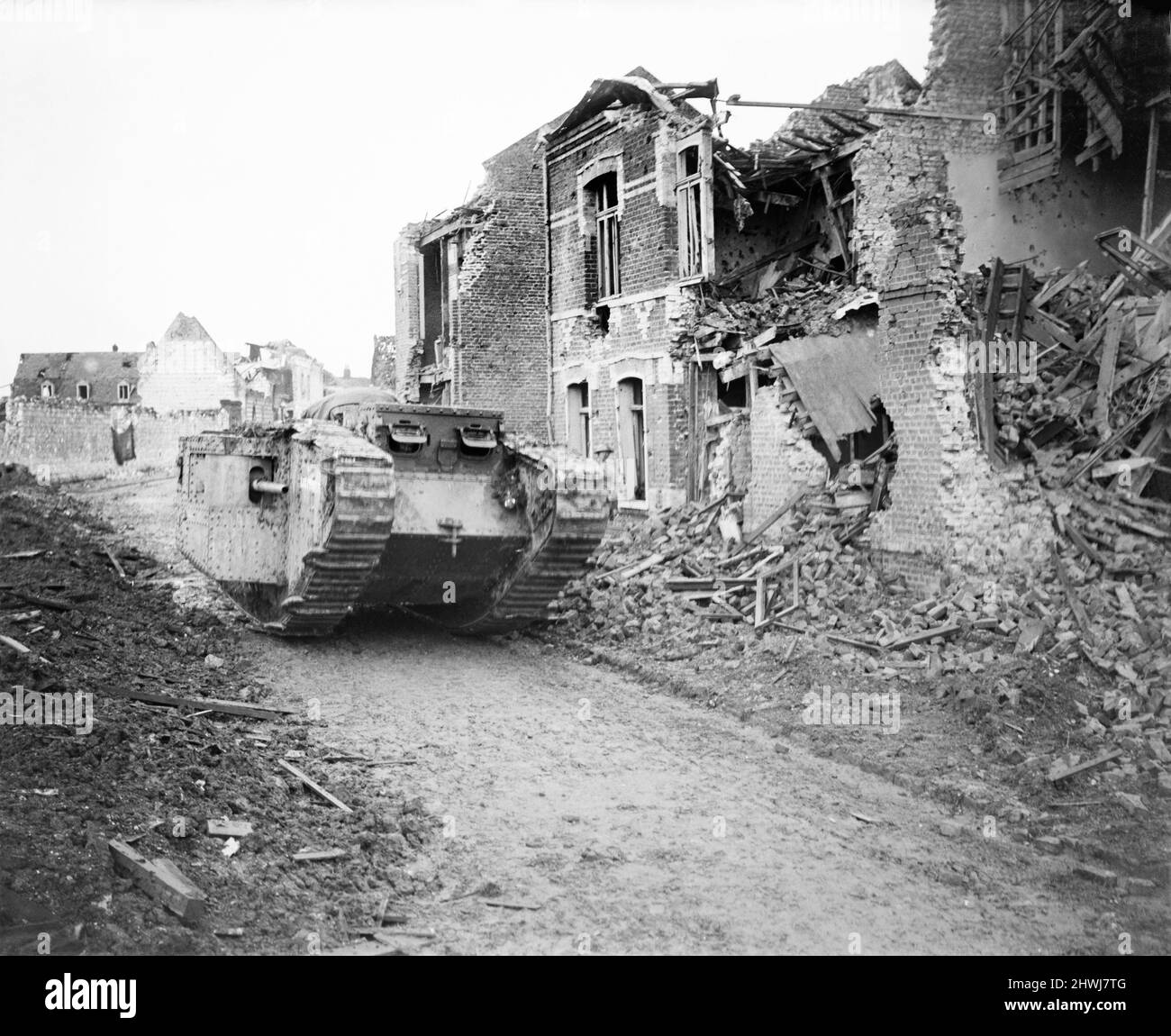 Mark II tank 'Lusitania' of the 1st Tank Brigade going forward along a ruined street in Arras, 10 April 1917. Stock Photo