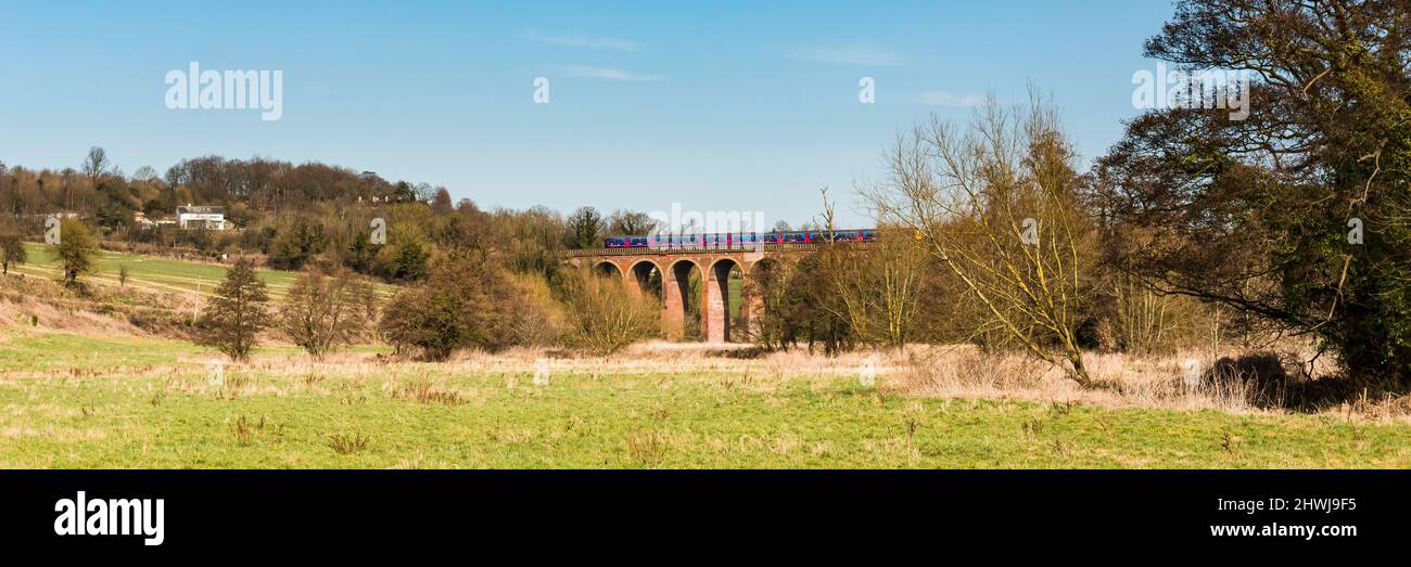 Eynsford viaduct in Kent with a crossing train. Stock Photo