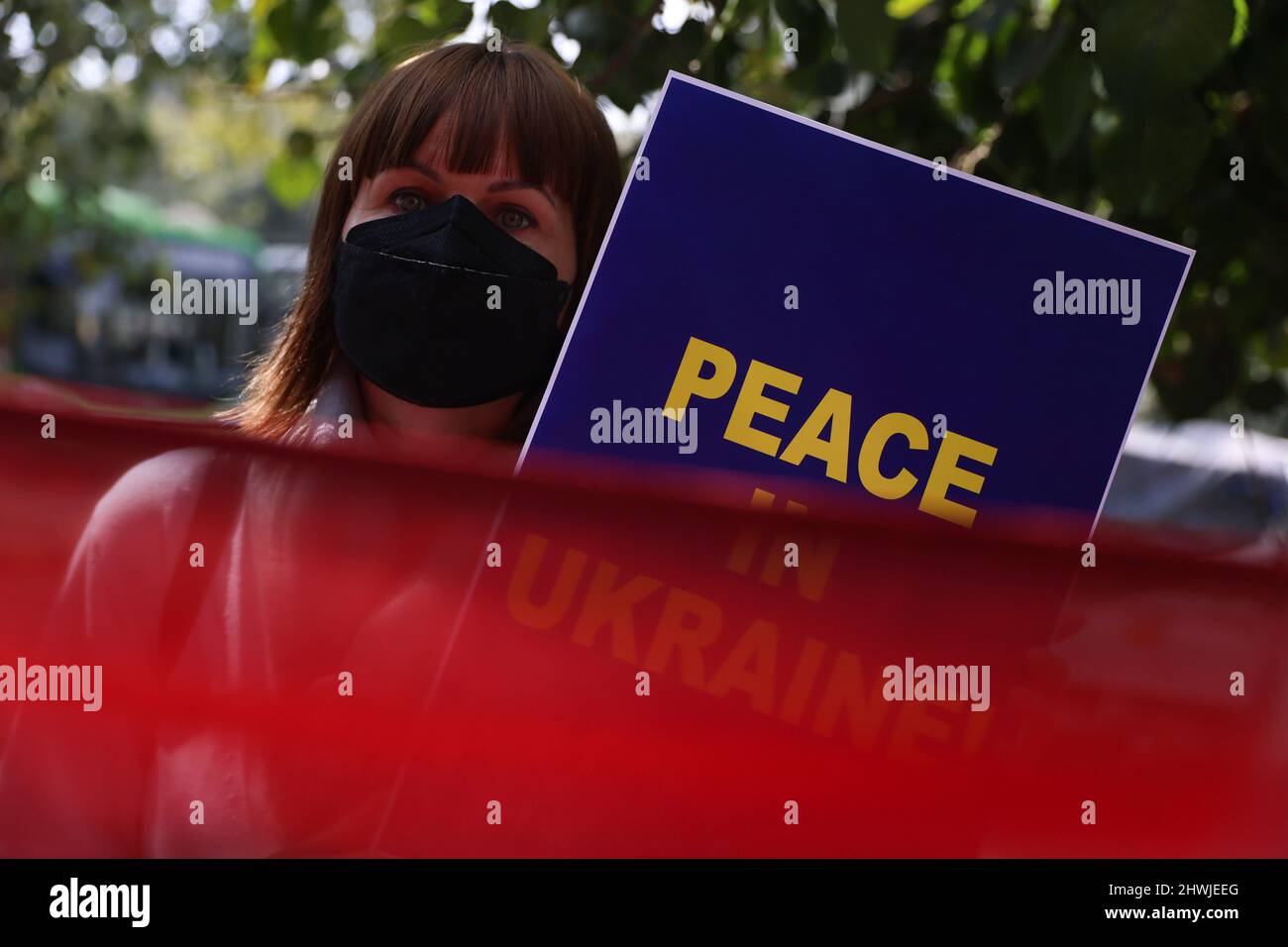 New Delhi, New Delhi, India. 6th Mar, 2022. A woman holds a placard in solidarity with the people of Ukraine after Russia's invasion. (Credit Image: © Karma Sonam Bhutia/ZUMA Press Wire) Stock Photo