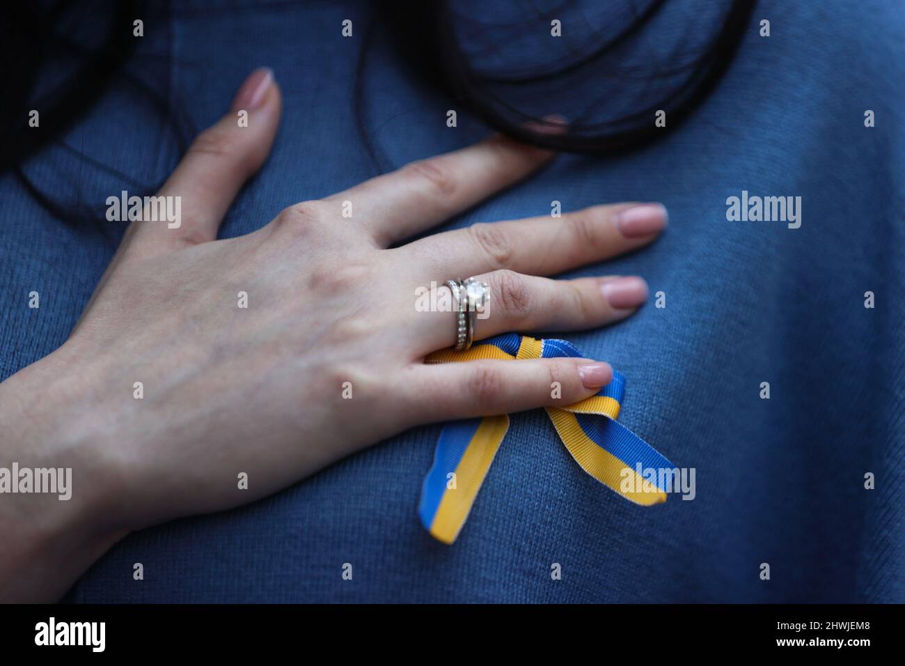New Delhi, New Delhi, India. 6th Mar, 2022. A Ukrainian woman places her hand on her chest in solidarity with the people of Ukraine after Russia's invasion. (Credit Image: © Karma Sonam Bhutia/ZUMA Press Wire) Stock Photo