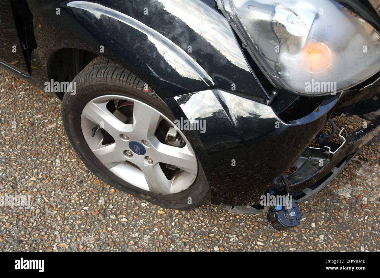 Frontal Damage to a Car Following a Road Traffic Collision. Stock Photo