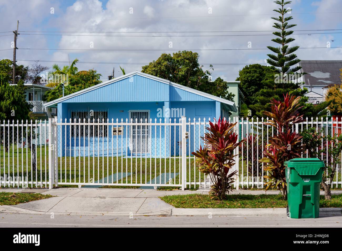 Miami, FL, USA March 5, 2022 Blue house with white fence Overtown