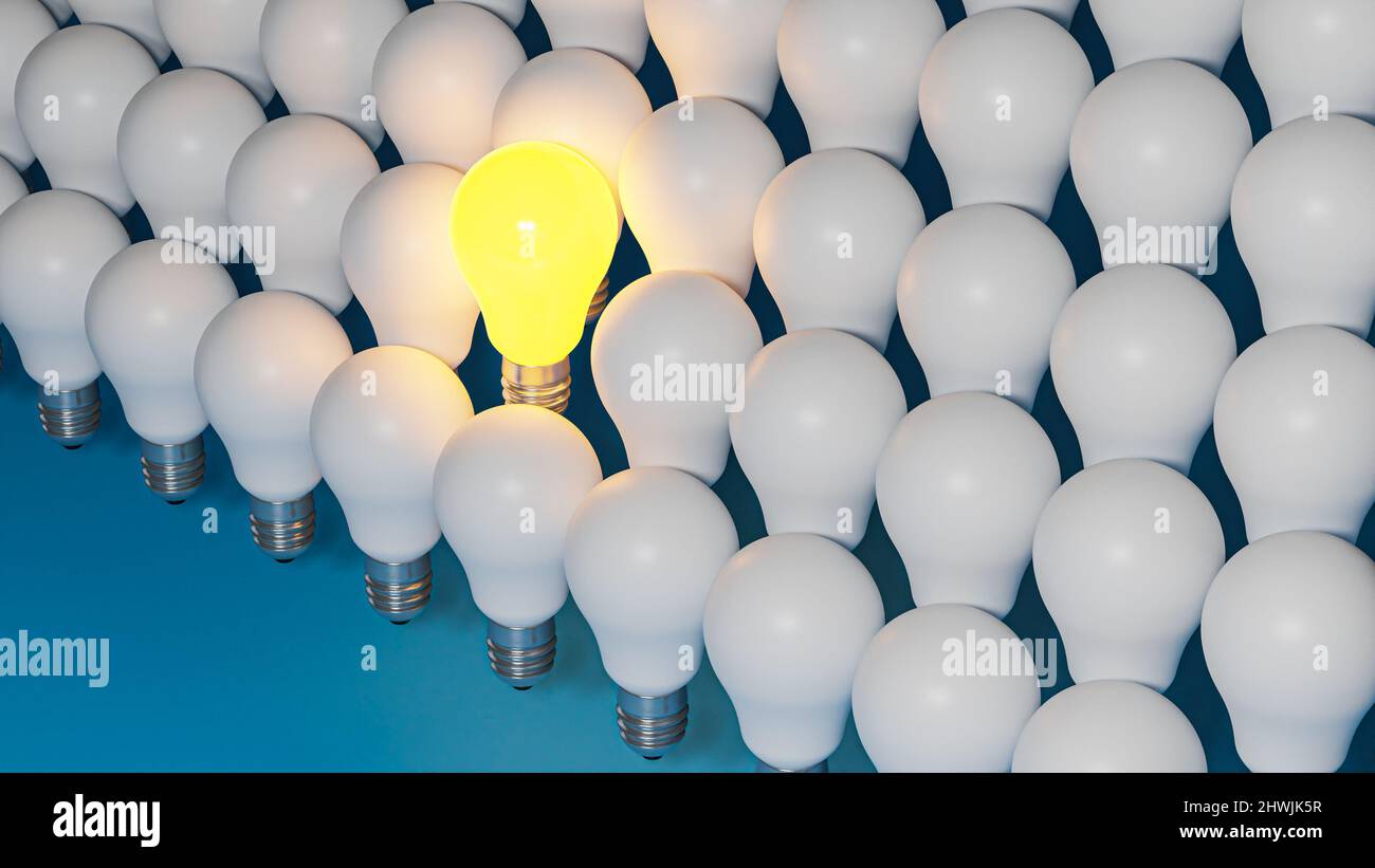 One shiny lightbulb between other dim lightbulbs, unique person, unique idea, concept of uniqueness, abstract concept of individuality, background. Stock Photo