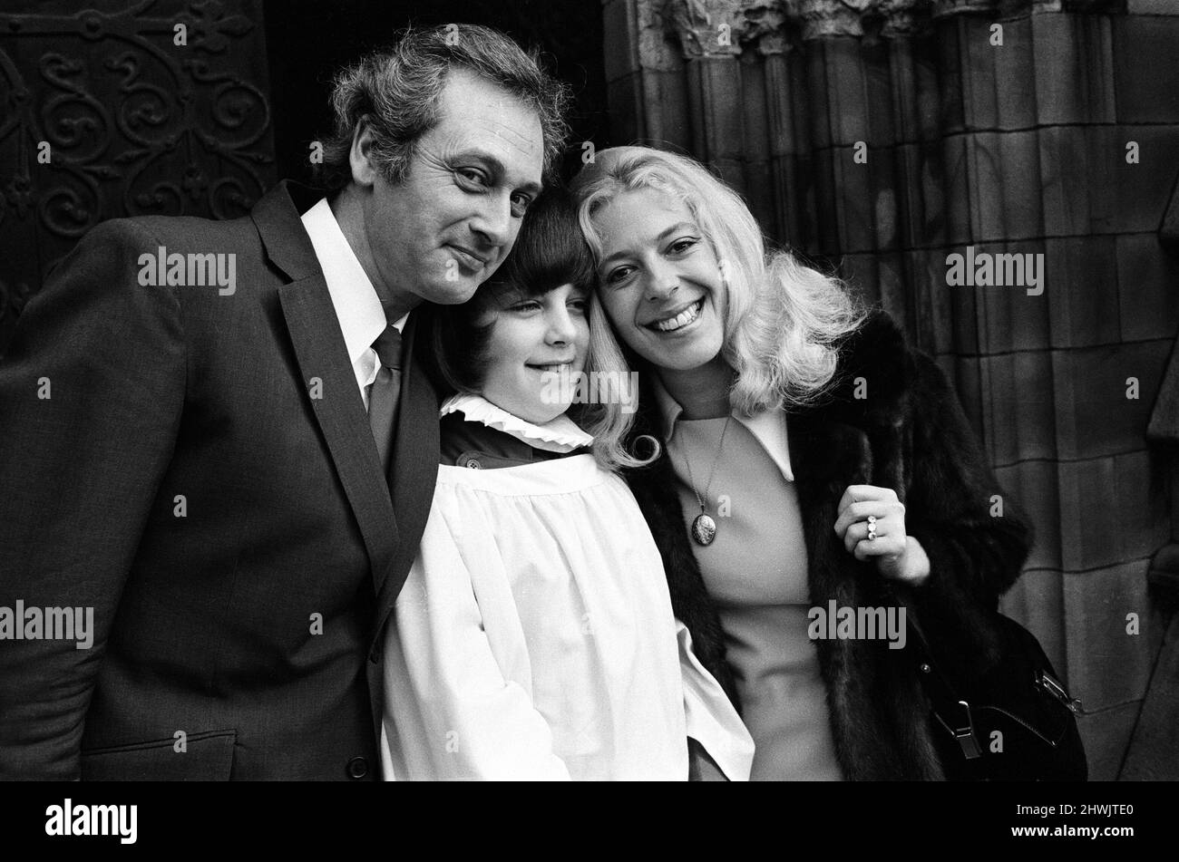 Granada TV star Julie Goodyear, 30, who plays the barmaid in the Rovers Return in 'Coronation Street' is pictured with her husband-to-be Tony Rudman, 42, and her son from a previous marriage, Gary Goodyear, 12. Gary is a choirboy at Bury Parish Church where they will wed. 18th February 1973. Stock Photo