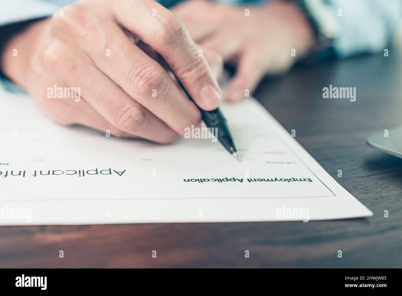 new employees to fill out job application documents. job vacancy, job application concept. Stock Photo