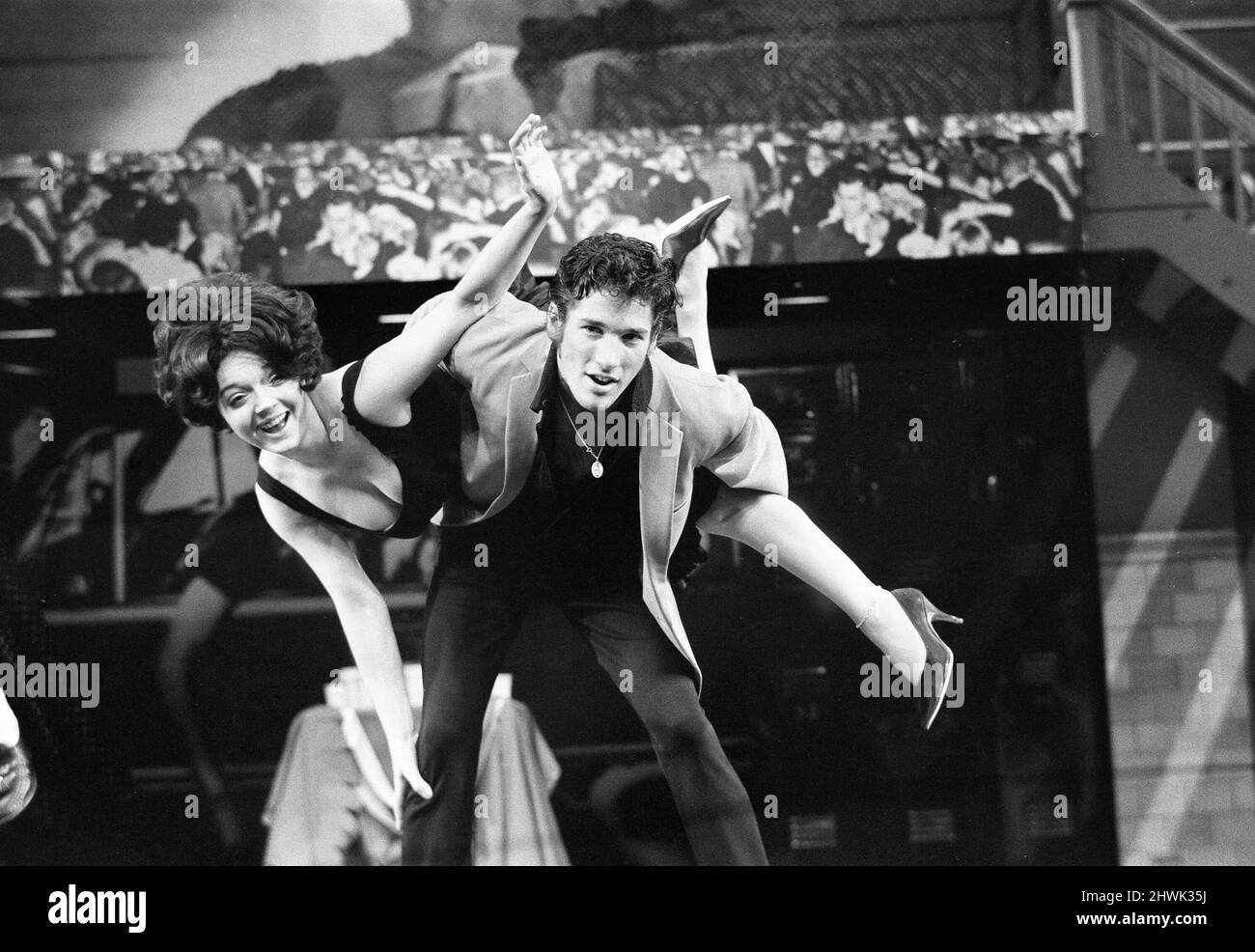 The cast of the American musical Grease rehearsing at the New London