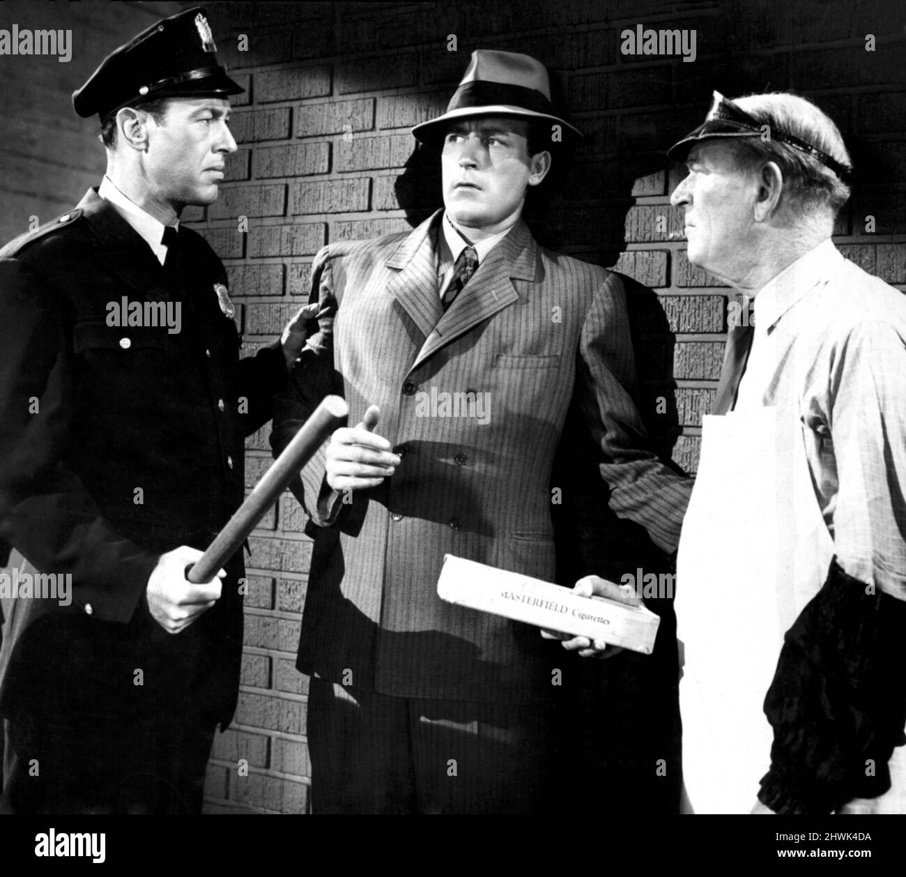 JACK MULHALL, LAWRENCE TIERNEY, DILLINGER, 1945 Stock Photo