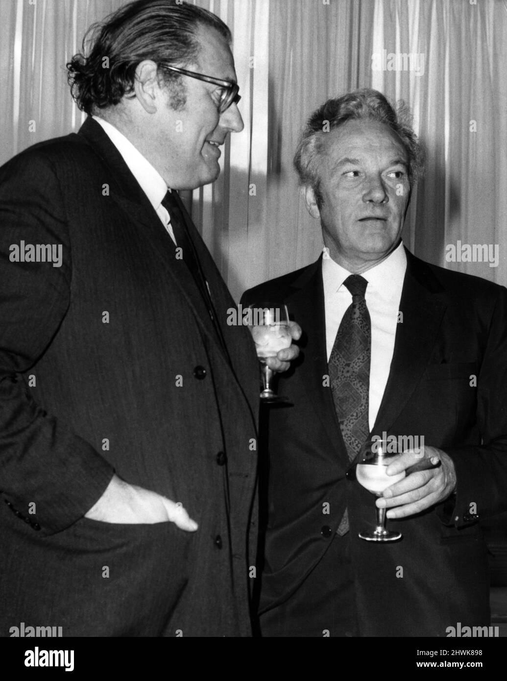 Hugh Cudlipp, Chairman of the International Publishing Corporation, pictured with Home Secretary, Reginald Maudling, at Reception, 8th November 1971. Stock Photo